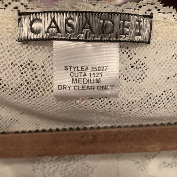 Lace Top alone or has a skirt sold separately. - Picture 2 of 2